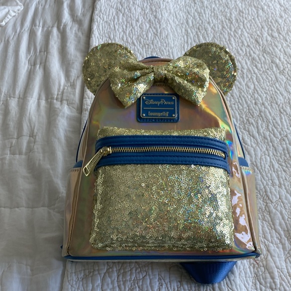 NWT Loungefly Disney Parks iridescent gold with sequence backpack - Picture 1 of 4